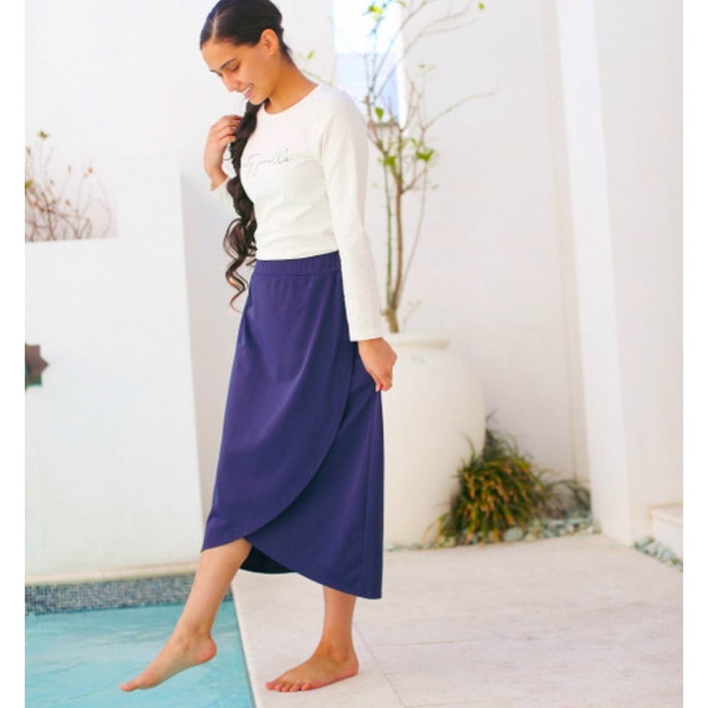 Dainty jewells, burgundy and pink swim skirt​